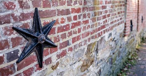 a metal star on house|metal stars on old buildings.